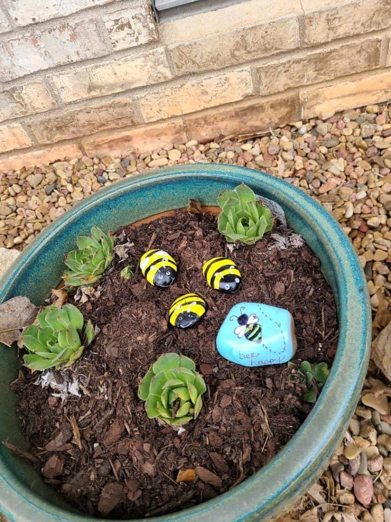 Bee Rock Painting - Finished Project in Garden