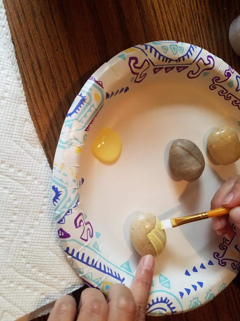 How to Paint a Ladybug on a Rock - Painting a base coat on your rocks 