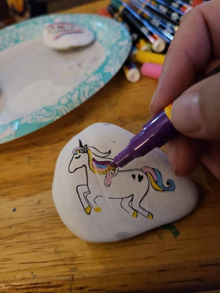 Painting Unicorn on Rock