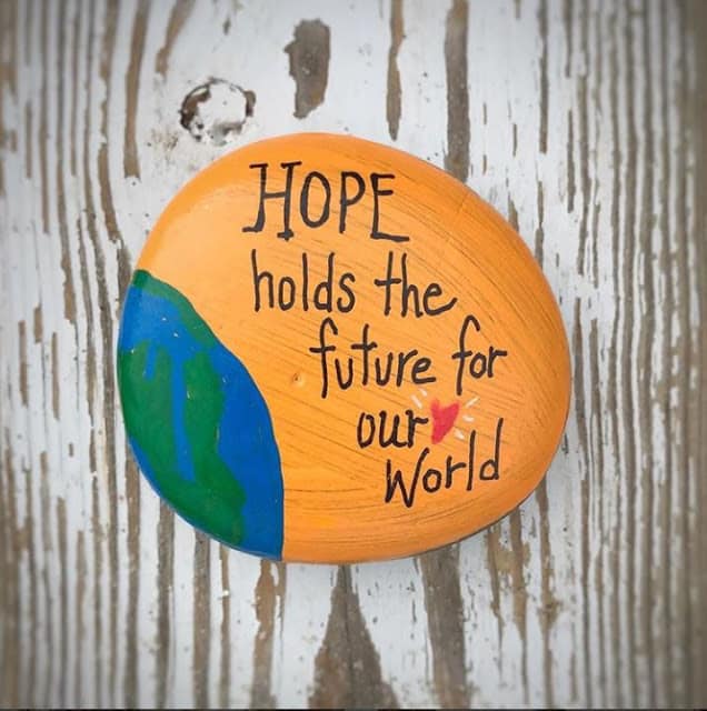hope holds the future of our world painted rock