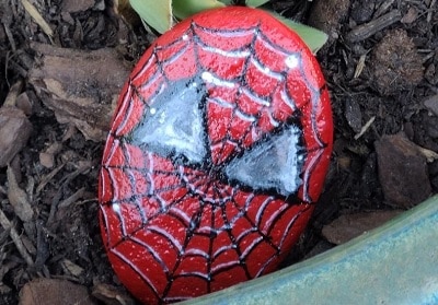 Paint Spider-Man on a rock