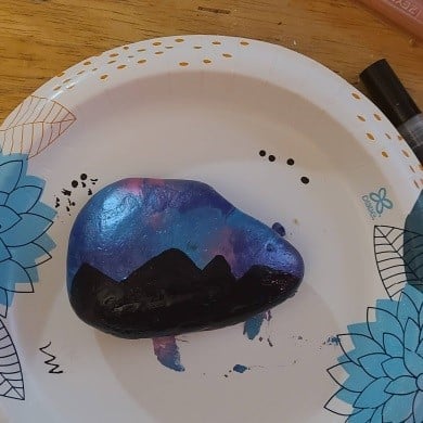Saran wrap painted rock add detail 2