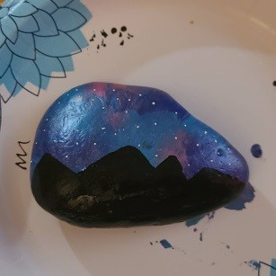 Saran wrap painted rock add detail 5