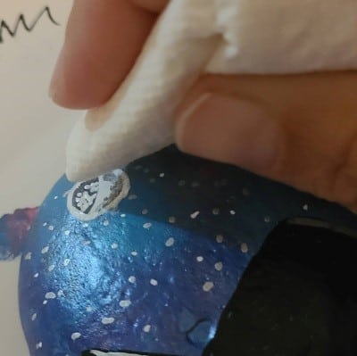 Saran wrap painted rock add moon 1