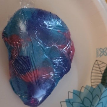 Wrap rock with saran wrap