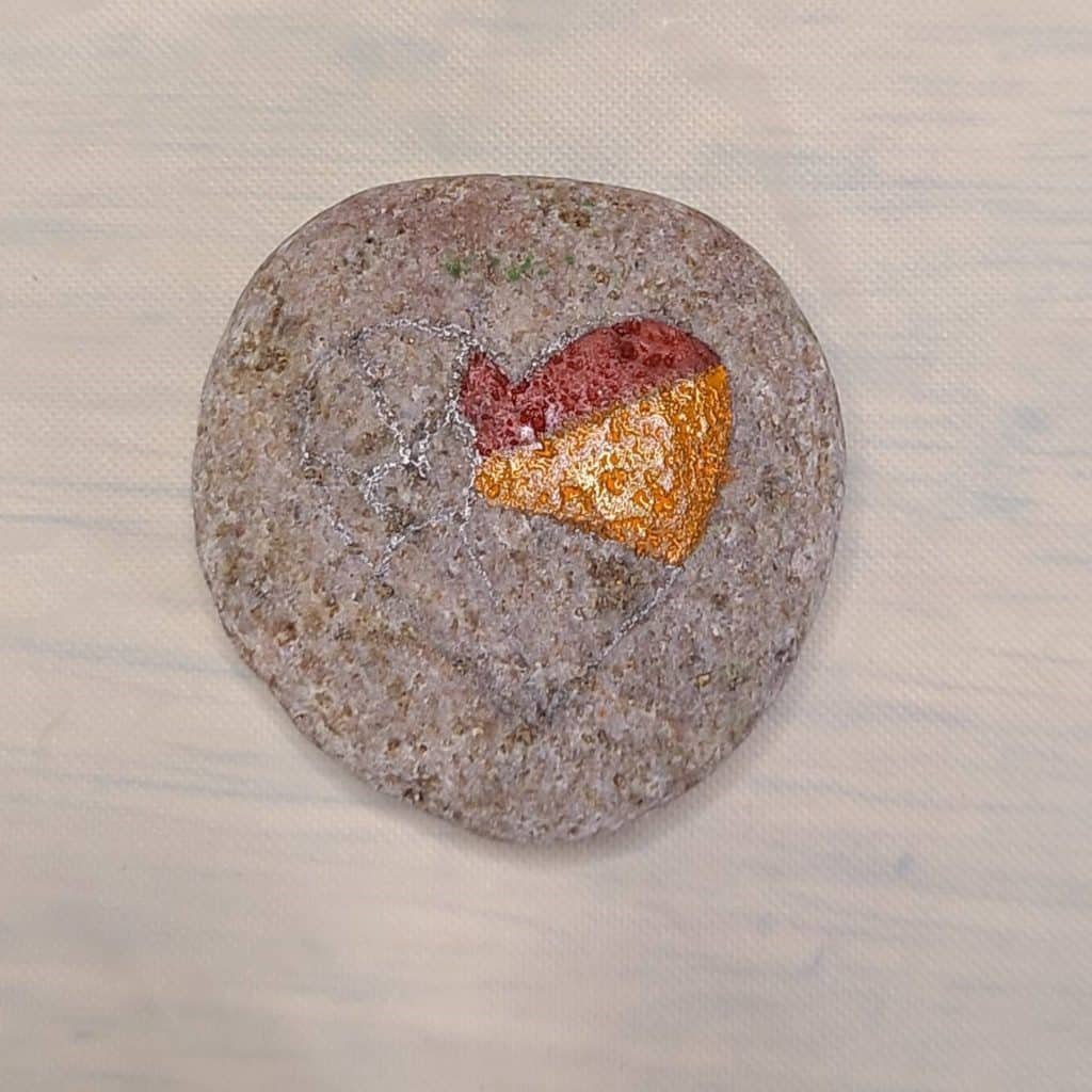 Painting the heart rock - orange