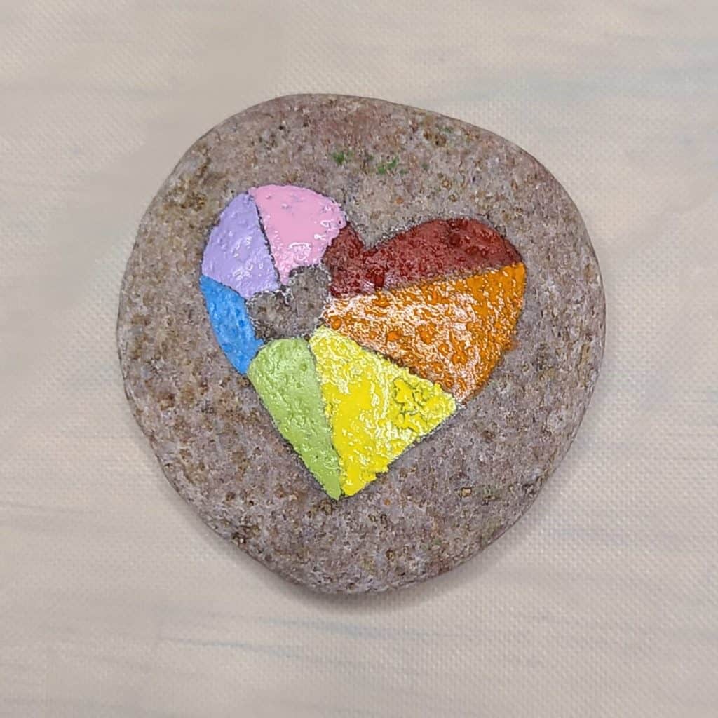 Painting the heart rock - pink