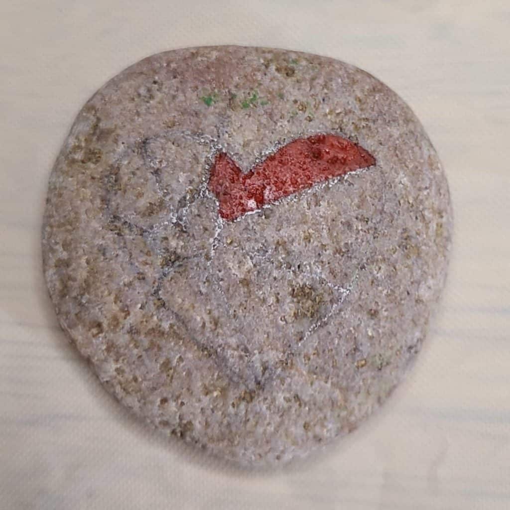 Painting the heart rock - red