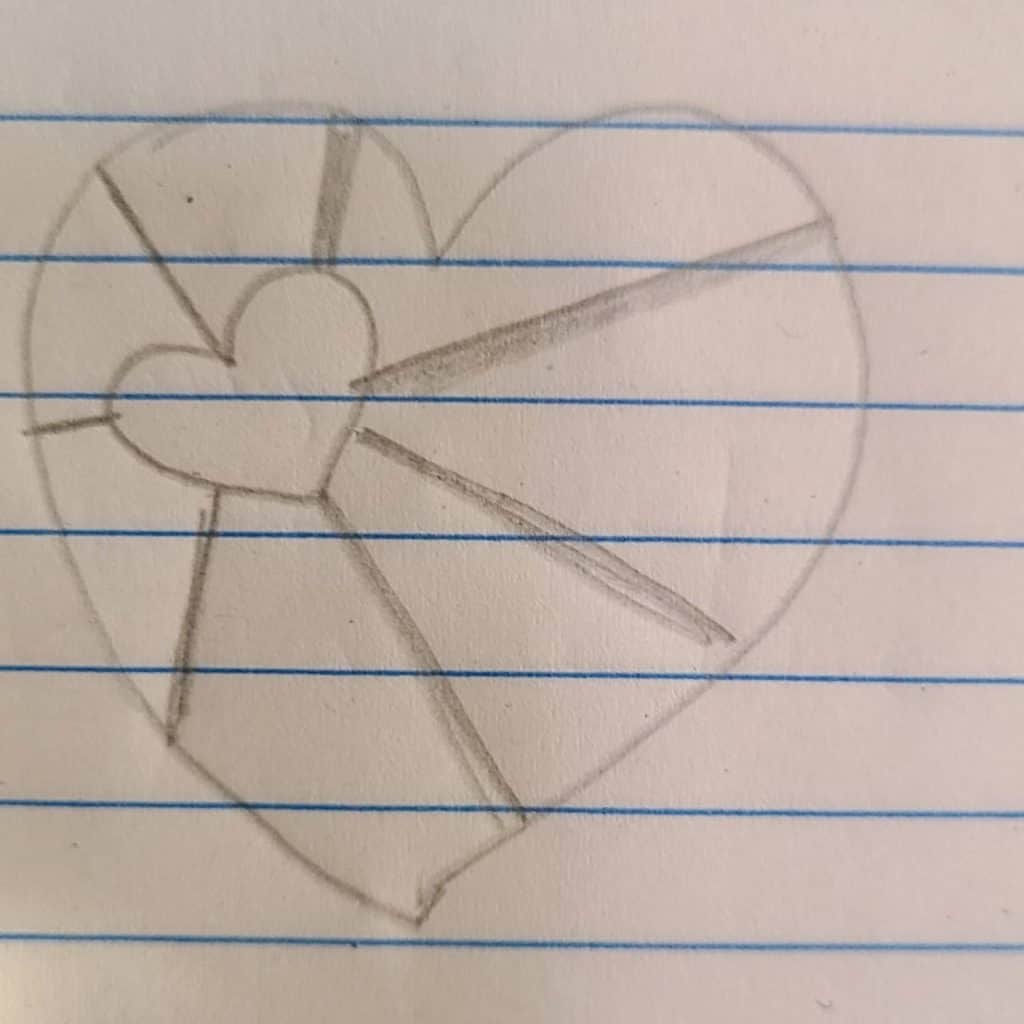 Practicing drawing a heart for your rock