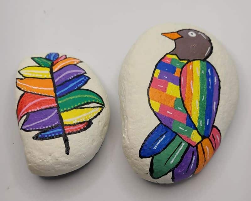2 colorful painted rocks