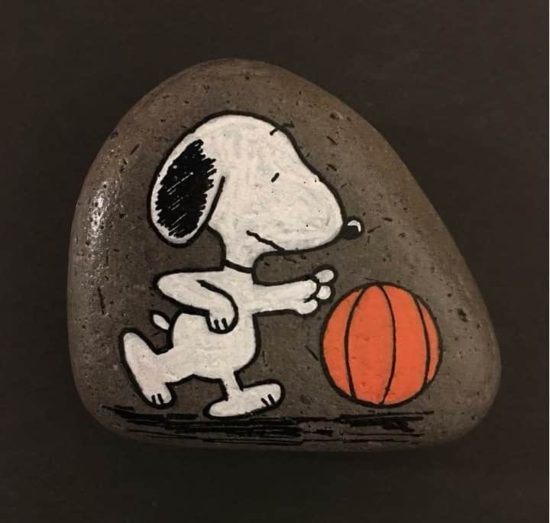 Snoopy basketball painted rock by Amy Clark