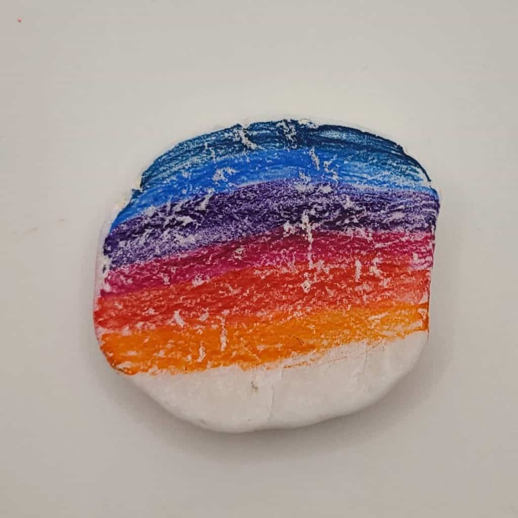 coloring rock with pencils