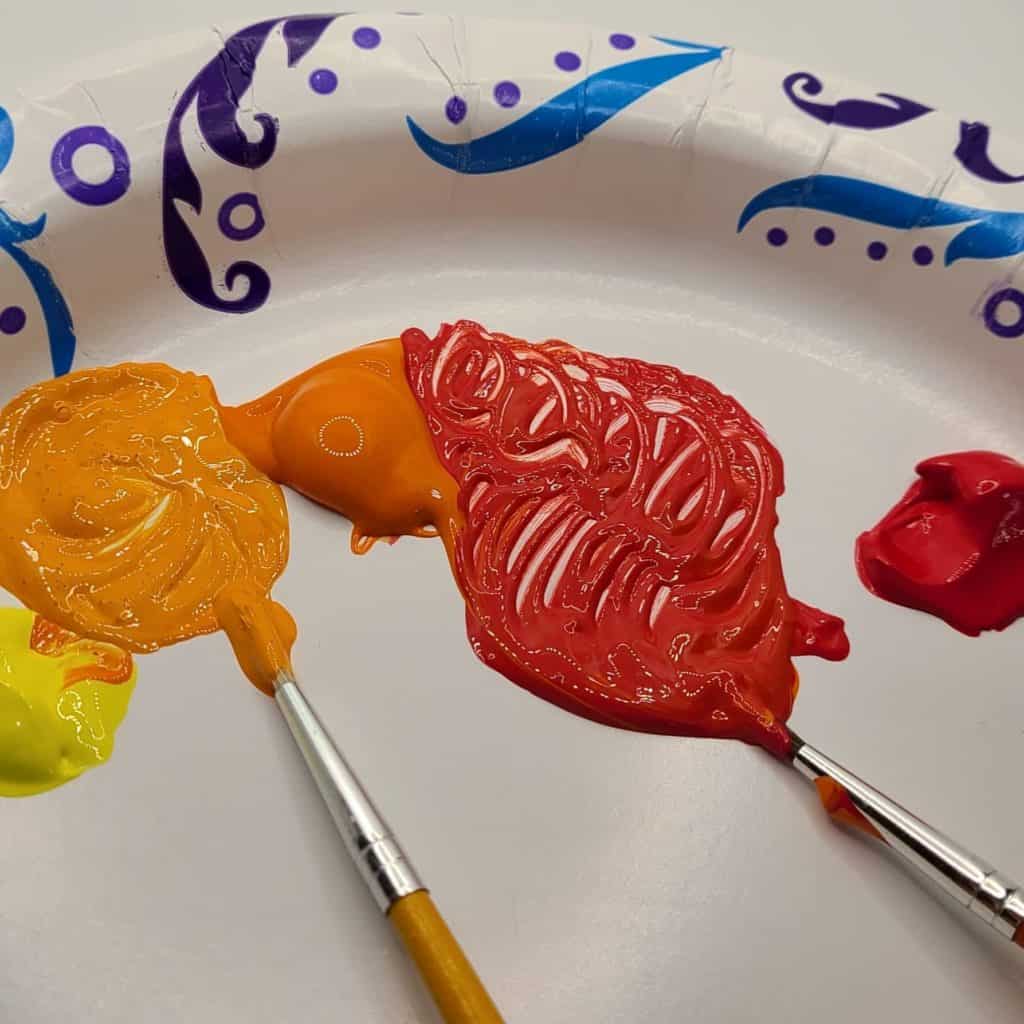 sunset painted rocks blending paint