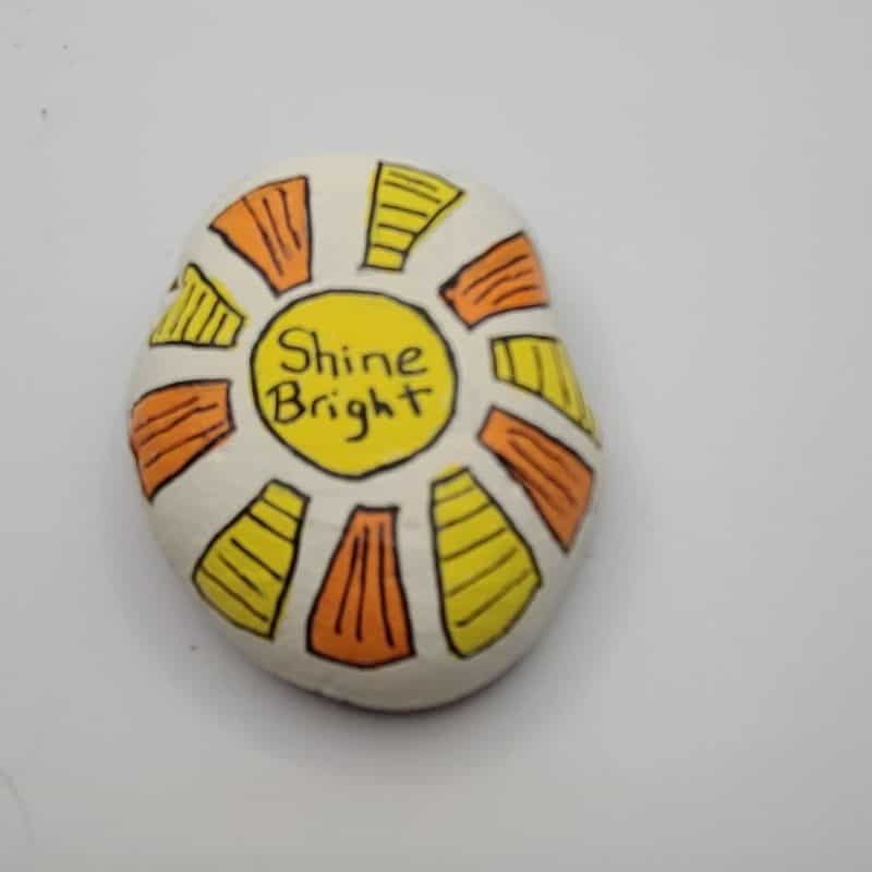 sun painted rocks design 2c