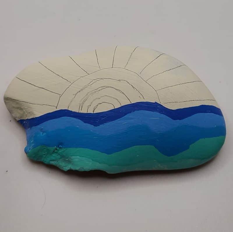 sun painted rocks design 3b