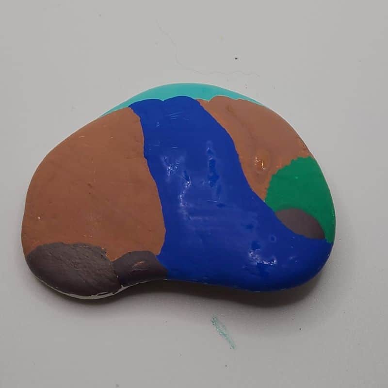 paint a waterfall on a rock design 1c