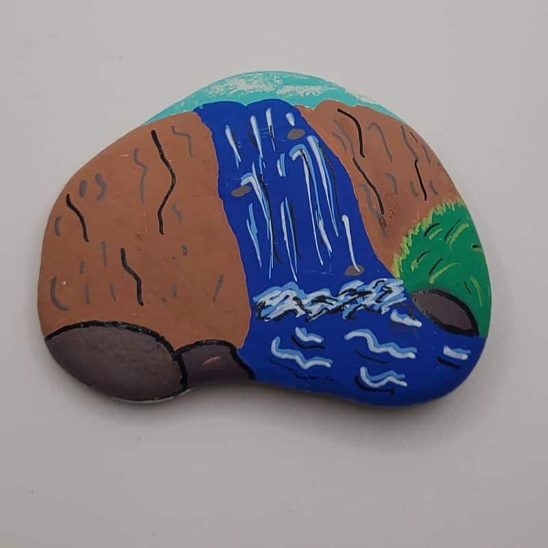 paint a waterfall on a rock design 1d