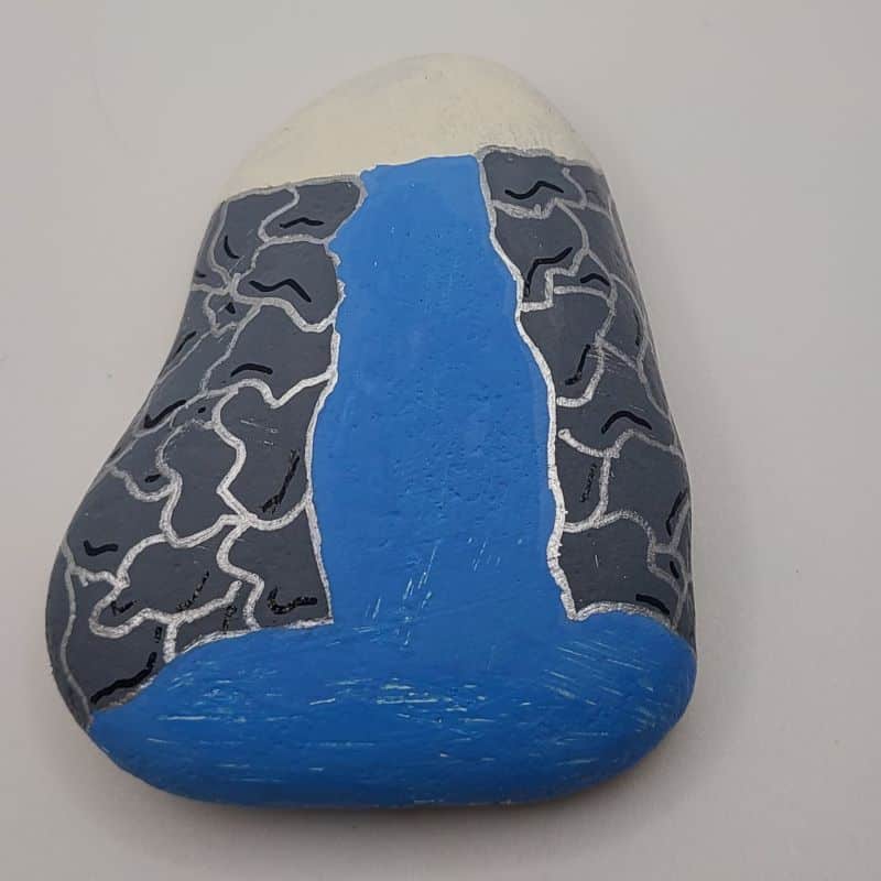 paint a waterfall on a rock design 2c