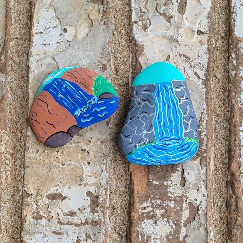 paint a waterfall on a rock