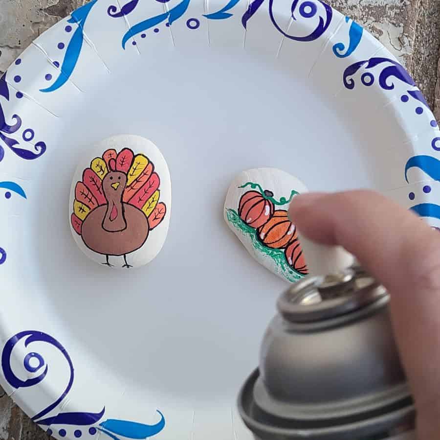 Sealing the Thanksgiving Painted Rocks