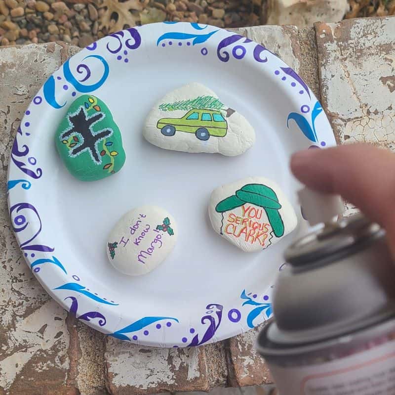 Christmas Painted Rocks - Sealing Christmas Vacation Rocks