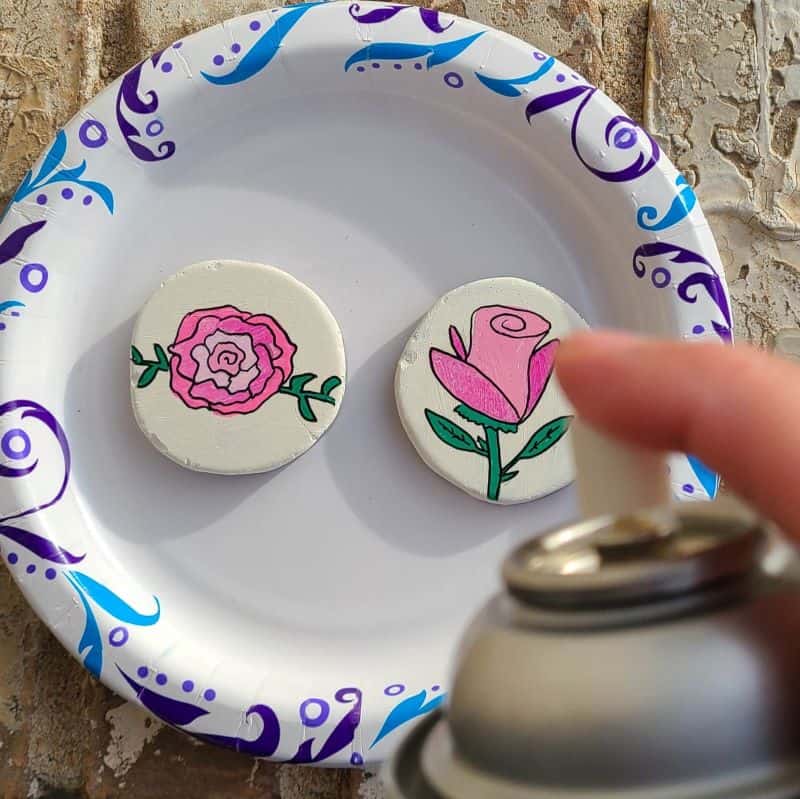 sealing 2 rose painted rocks
