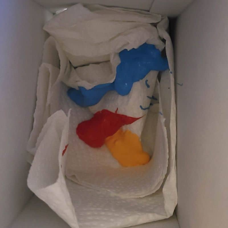 shake painted rocks - adding paint to box